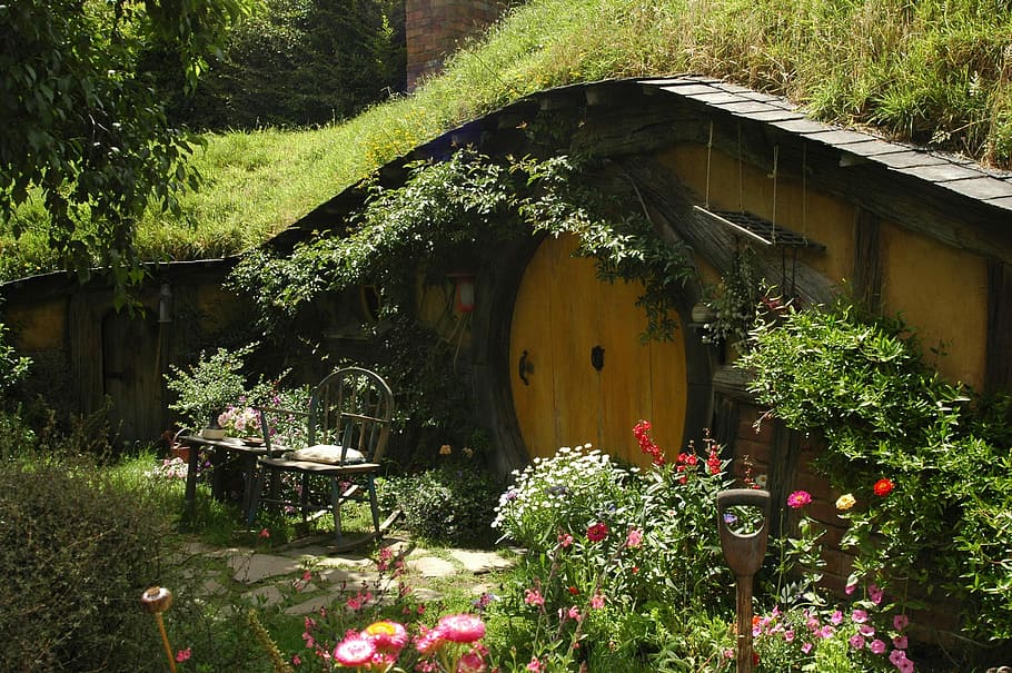 Hobbit's house surrounded with plants, nature, movie set, green