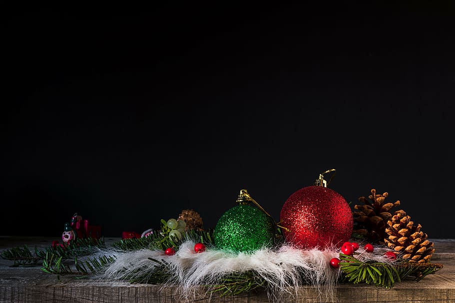 red and green bauble beside brown pine cones, christmas, pineapples HD wallpaper