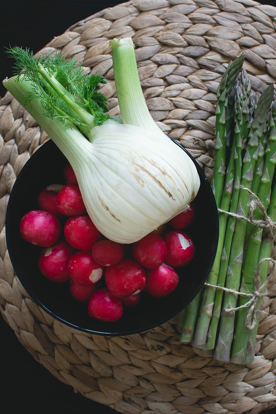 Fresh asparagus with radishes and fennel, healthy, top view, vegetables