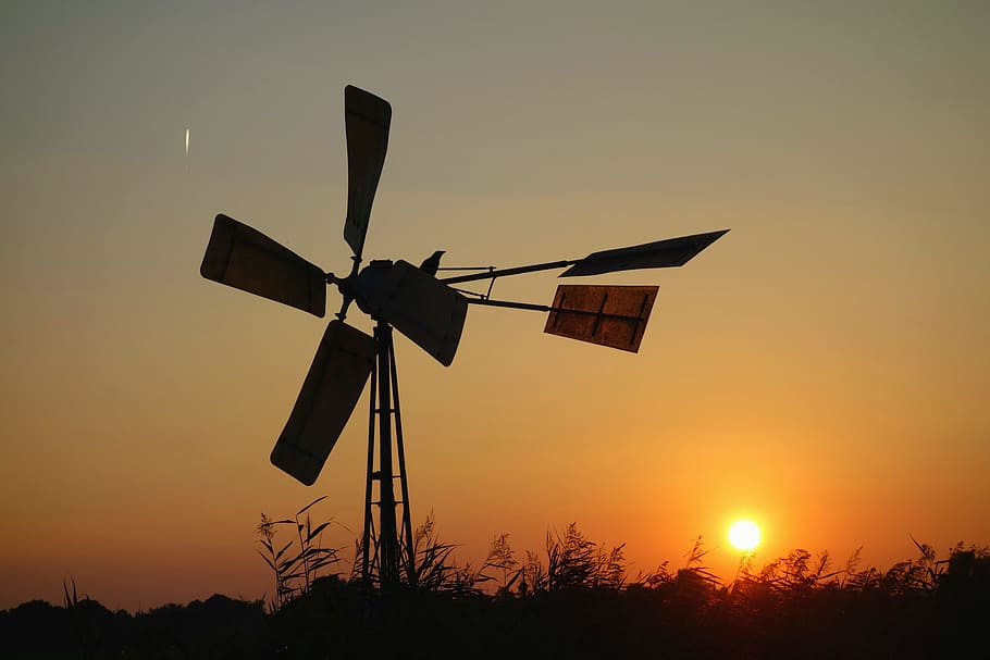 silhouette of windmill under golden hour, water pump, wind powered water pump HD wallpaper
