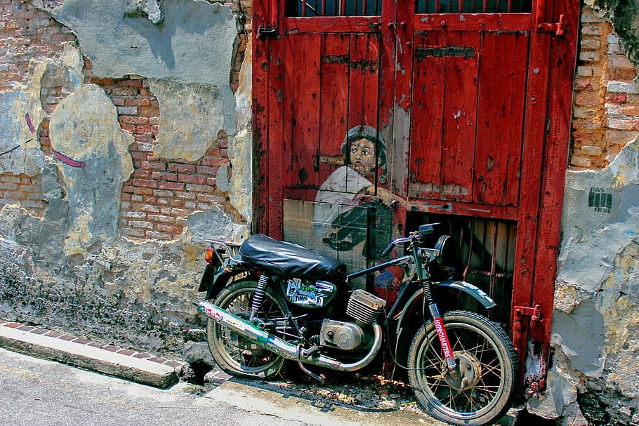 boy in white shirt painted in red wooden door beside motorcycle, HD wallpaper