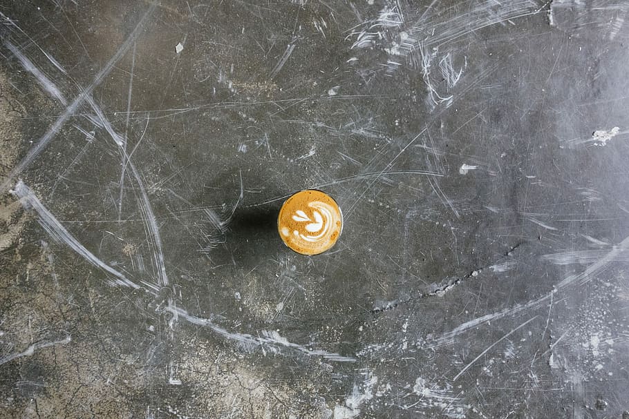 round gold-colored coin, coffee with designed top photography HD wallpaper