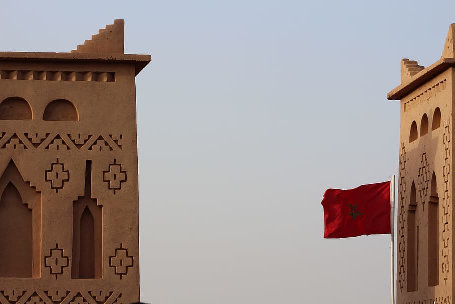 red flag between towers, morocco, wave, architecture, built structure HD wallpaper
