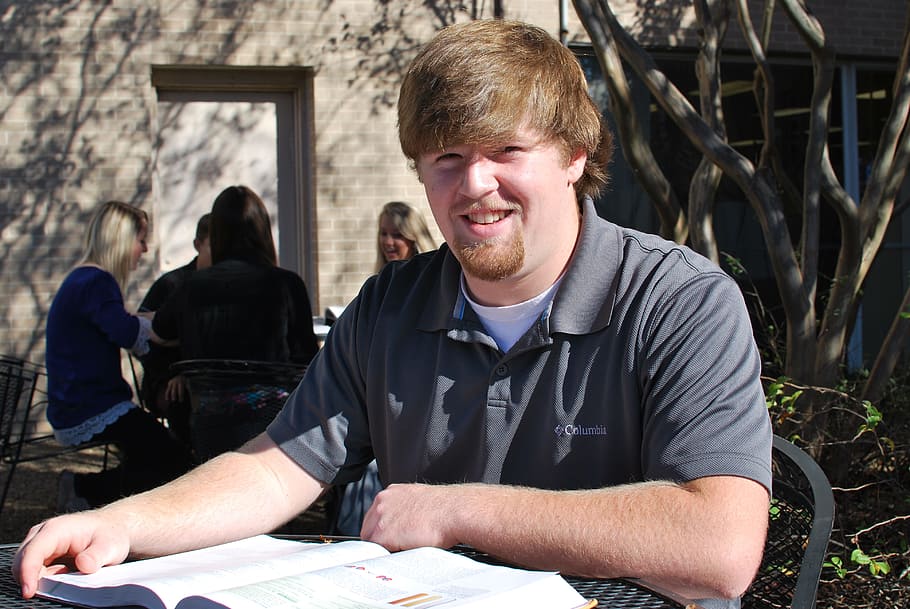 man smiling beside table during daytime, student, education HD wallpaper