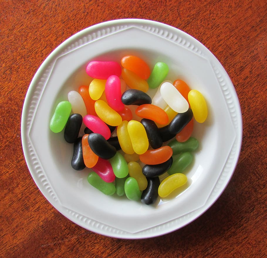 flat lay photography of candies on plate, jelly beans, jelly sweets
