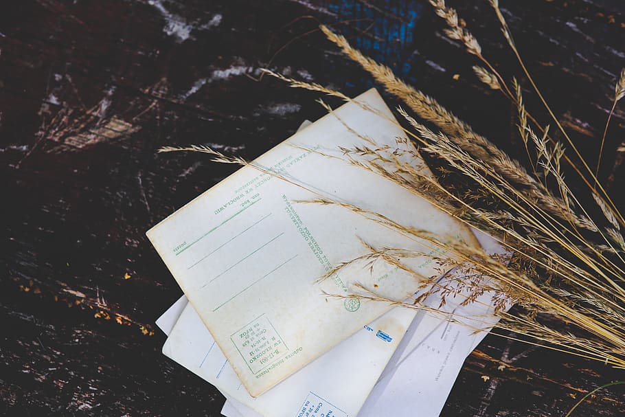 several papers on black wooden surface, old, vintage, postcard HD wallpaper