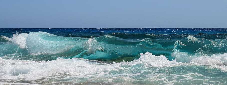 close-up photo of moving water at daytime, wave, smashing, foam