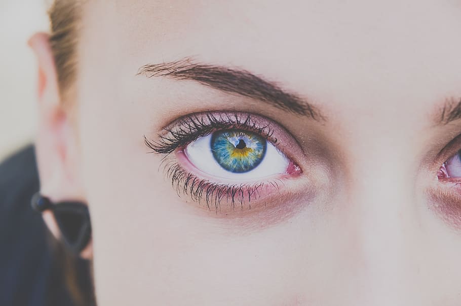 close up photography of woman's right eye, woman with blue eyes
