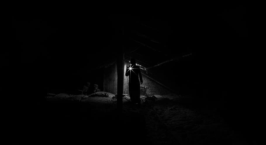 silhouette of man holding light, people, alone, attic, roof, dark