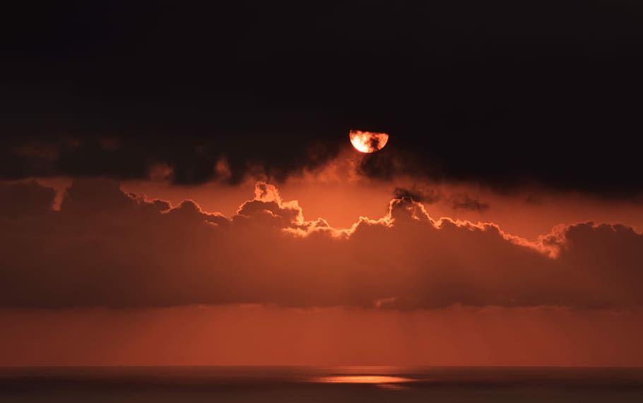 photography of red moon, sun covered by black clouds, sky, sunset HD wallpaper