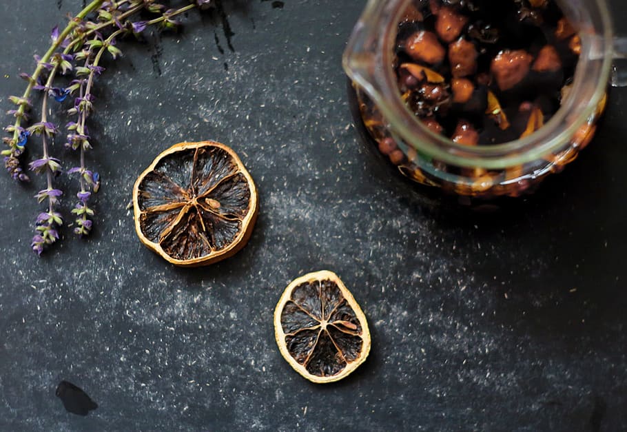 nuts filled glass pitcher on top of black table, lavender, tea HD wallpaper