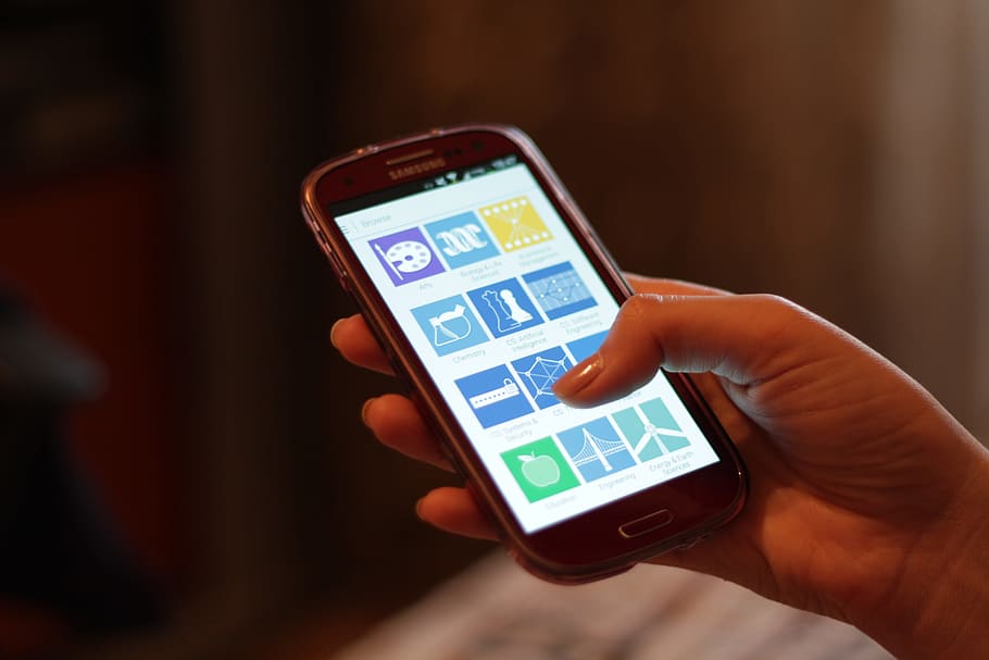 person using black Samsung Android smartphone, touchscreen HD wallpaper