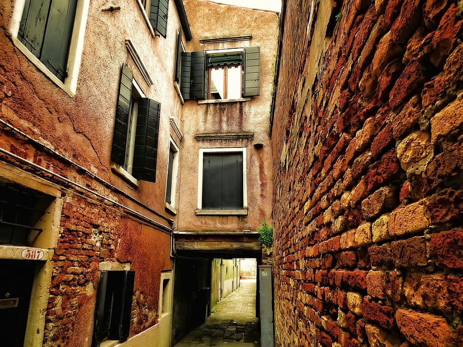 architectural photography of brown brick wall, venice, architecture