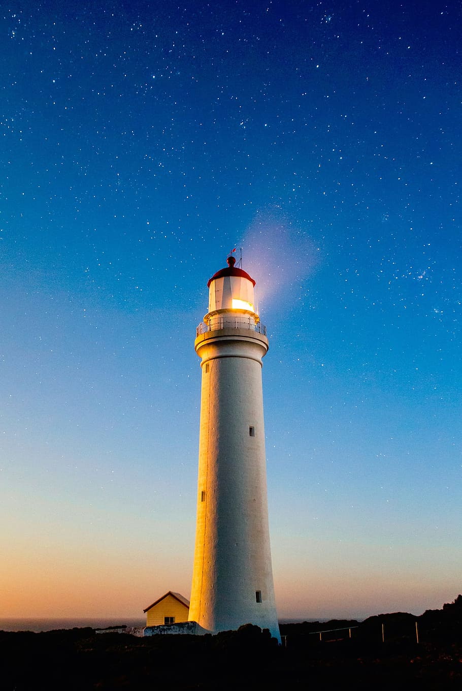 white lighthouse under starry night, structure, sky, stars HD wallpaper