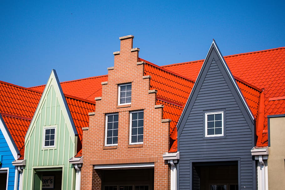 orange, gray, and teal painted house, brown, black, and green house with red roof HD wallpaper