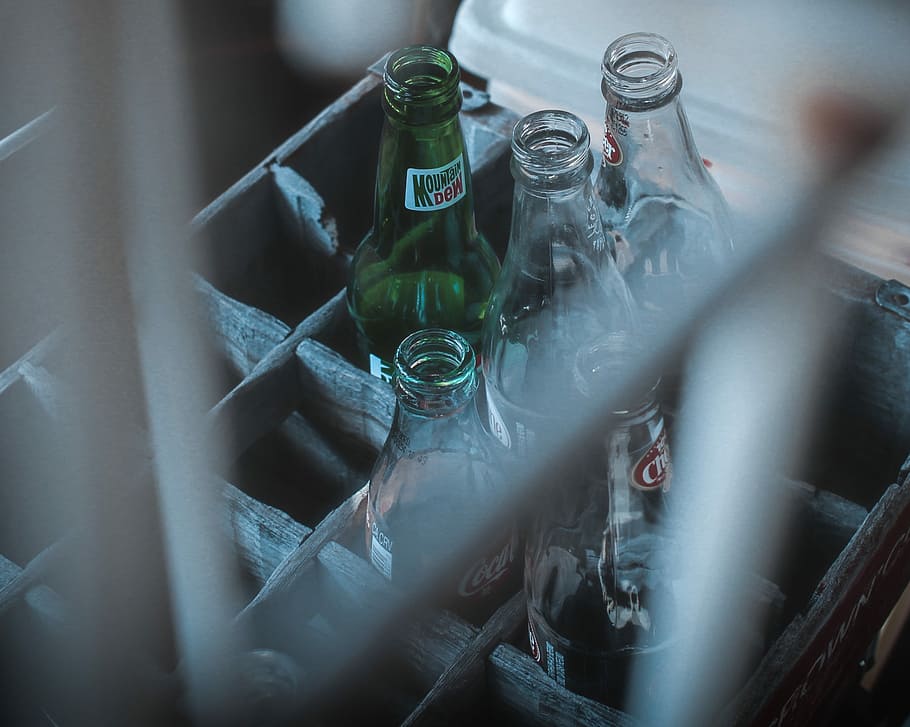 photo of glass soda bottles on crate, selective focus photography of glass soda bottles HD wallpaper