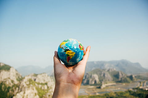 person holding globe, global, map, round, colorful, outdoor HD wallpaper