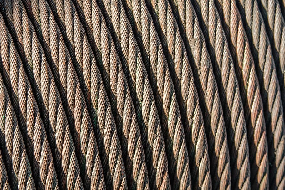 closeup photography of brown ropes, close-up photography of brown rope