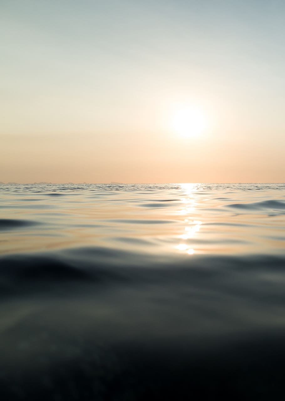 sea, ocean, water, reflection, waves, nature, sunset, sky, tranquility HD wallpaper