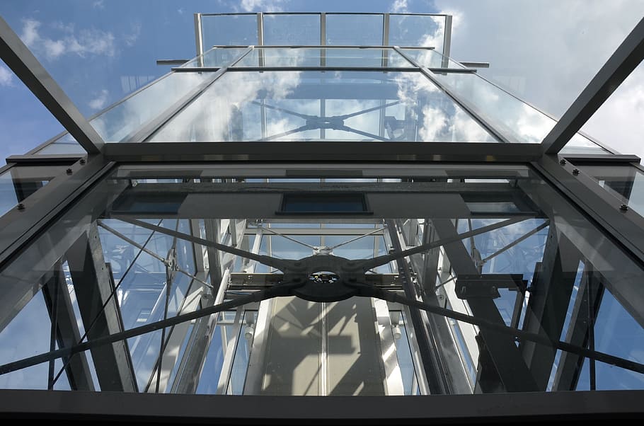 low angle photography of glass building, transport, elevator HD wallpaper