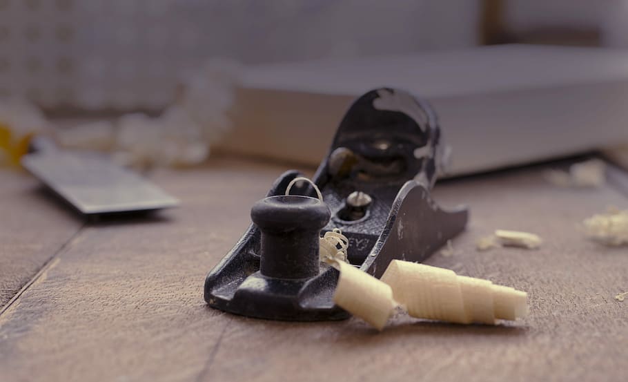 close photography of black jack planer near chisel, brown metal wood plane HD wallpaper