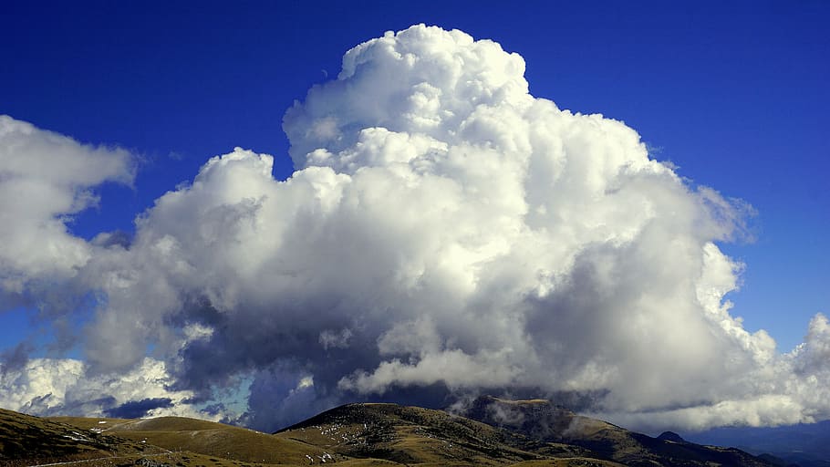 green hill under clouds, cumulonimbus, sky, time, atmosphere HD wallpaper