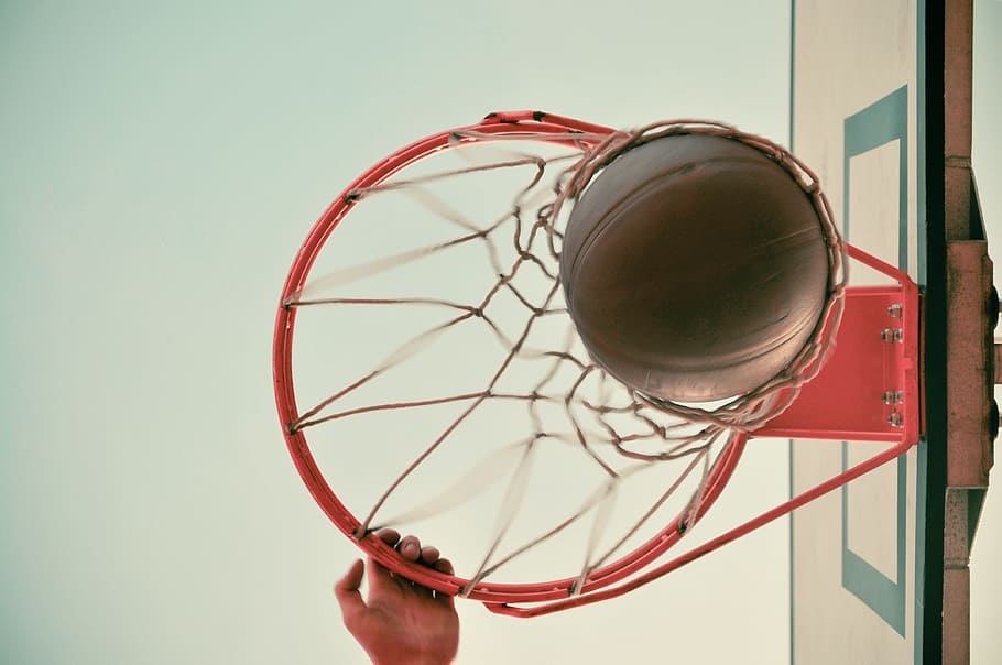 low angle photography of basketball on hoop, slam dunk, sport