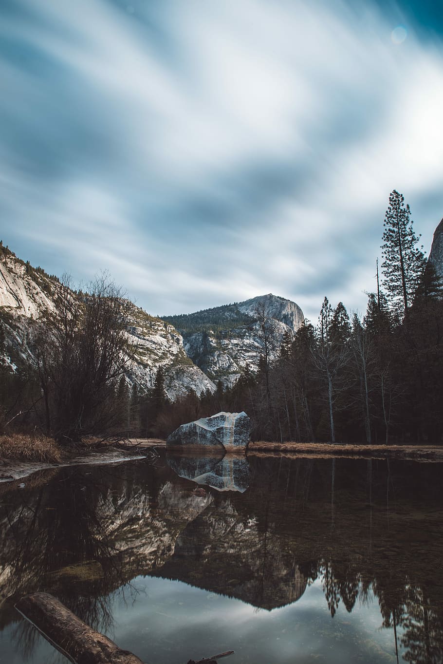 mirror photography of mountain and trees under white and blue skies, water mirror reflection of mountain under white clouds HD wallpaper