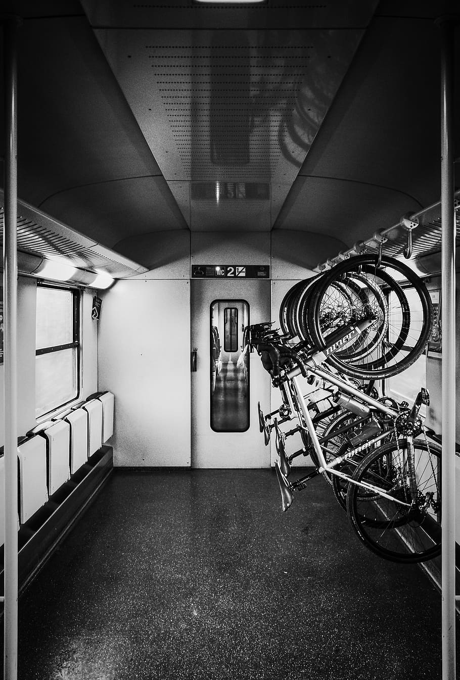 grayscale photo of bikes on rack, grayscale photo of bikes inside room HD wallpaper