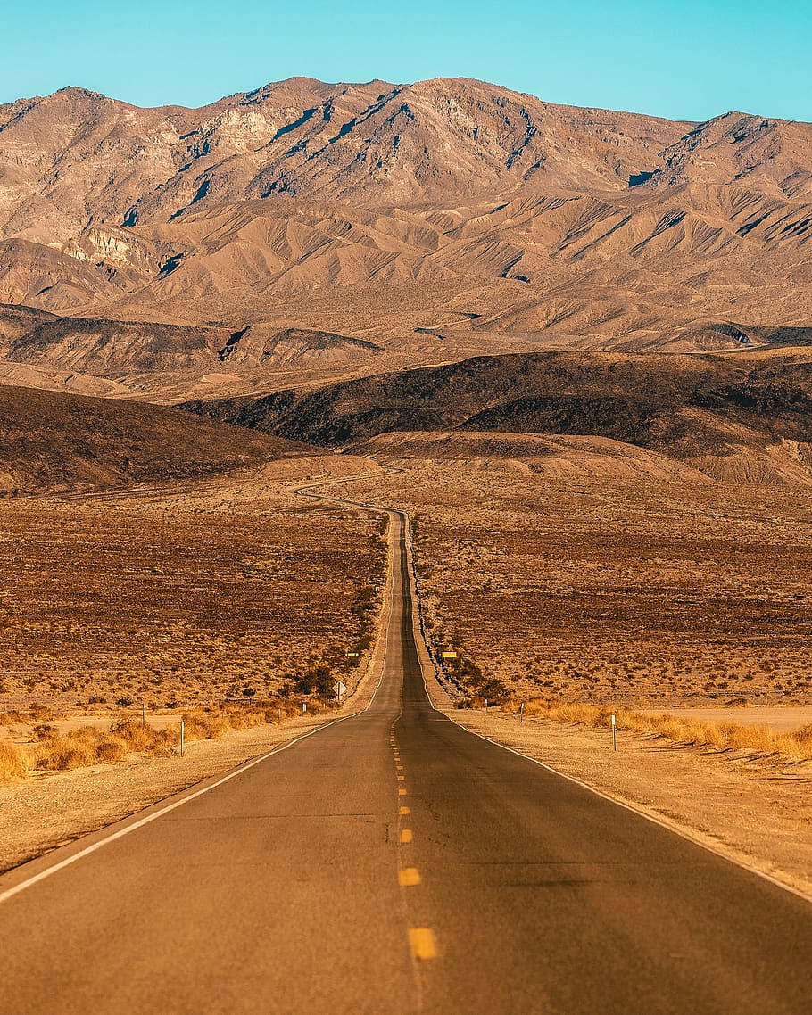 Death Valley, gray concrete road, mountain range, blue, tan, brown HD wallpaper
