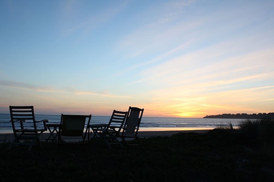deckchair on seashore under golden houir, sunset, chairs, beach HD wallpaper