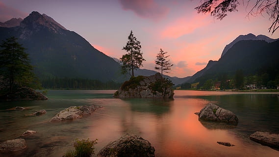 landscape photography of tree on rock formation surrounded by body of water near mountain during sunset, tree on rock formation surrounded by water during golden hour HD wallpaper