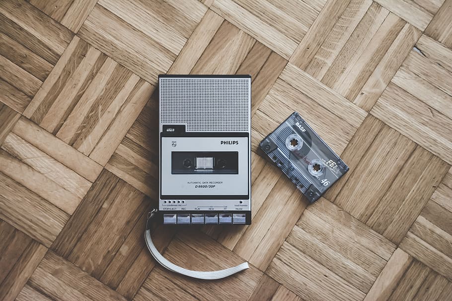 gray recorder with cassette tape, black and gray cassette tape and player layout photo HD wallpaper