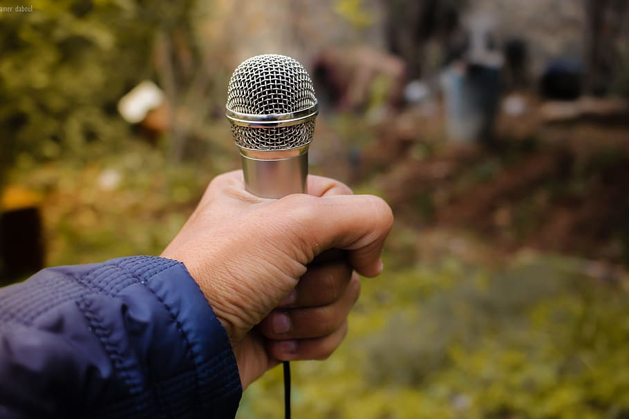 Person Holding Grey Corded Microphone in Selective Focus Photography Photo Taken, HD wallpaper