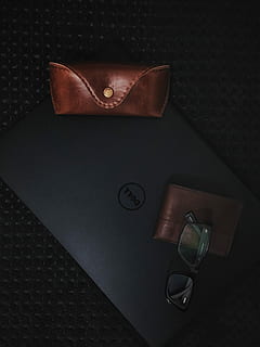 pink leather glasses case on top of gray Dell laptop, wallet HD wallpaper