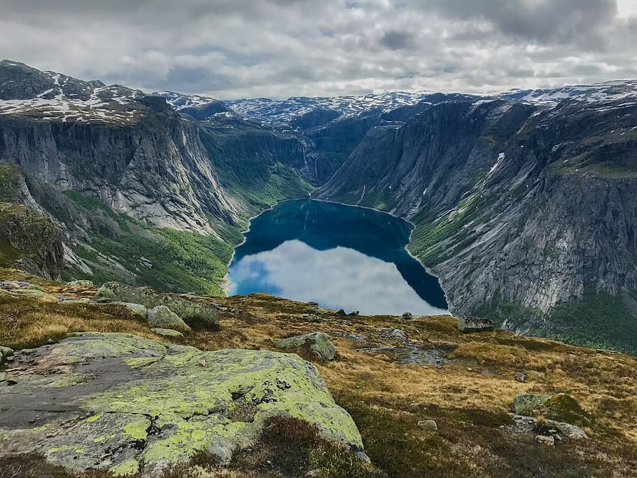 landscape photography of lake, aerial photo of lake surrounded by rock formation during daytime HD wallpaper