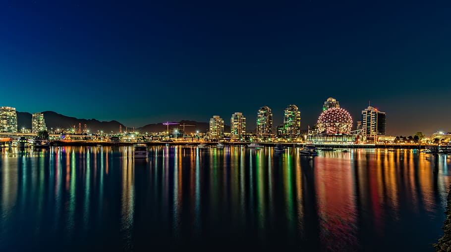 high-rise building with reflection on water, bay, blue, british HD wallpaper