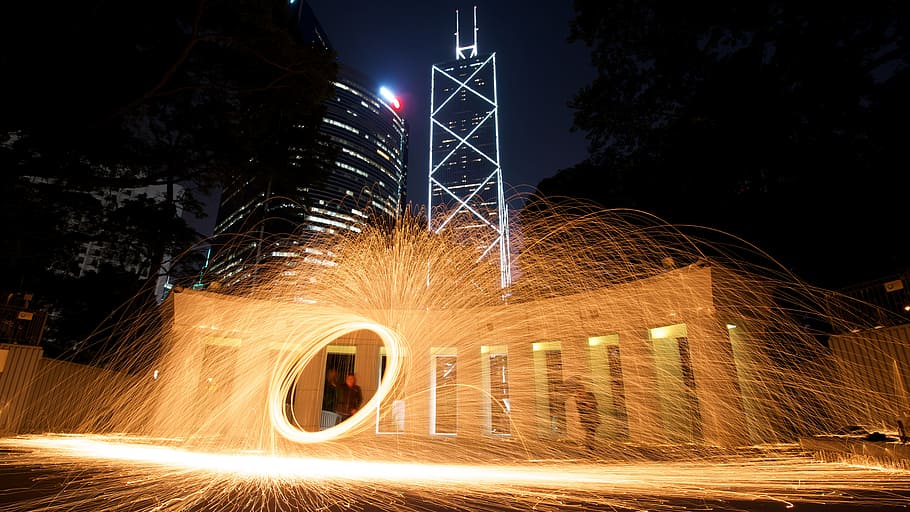 sparks, fire, light, rotation, flames, heat, action, person HD wallpaper