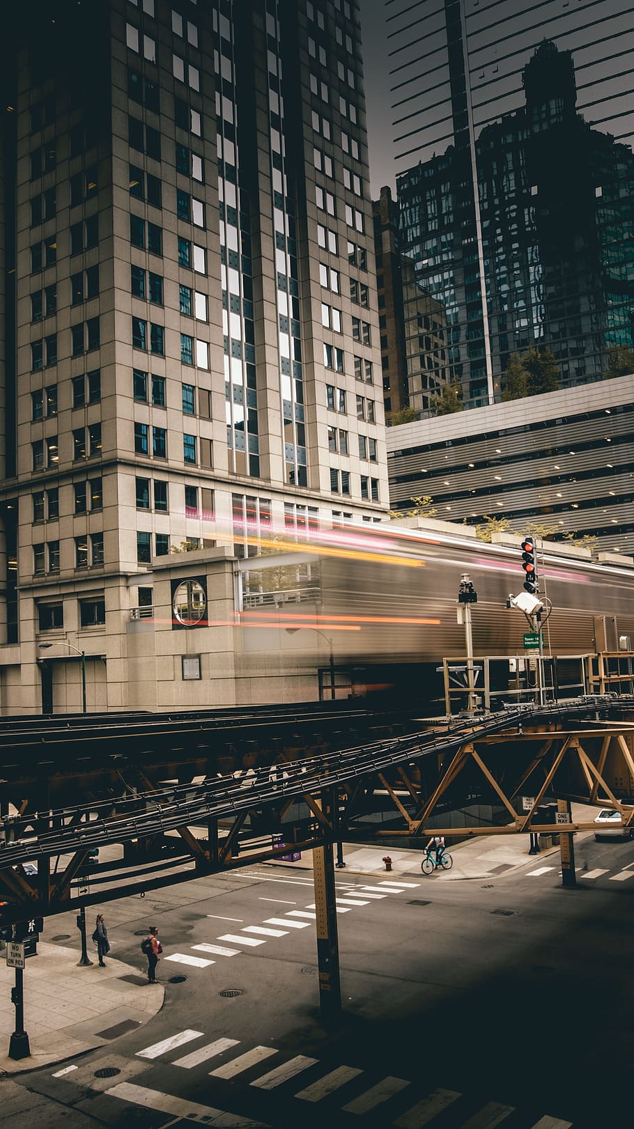 time lapsed photo of train on road, timelapse photography of train passing near buildings