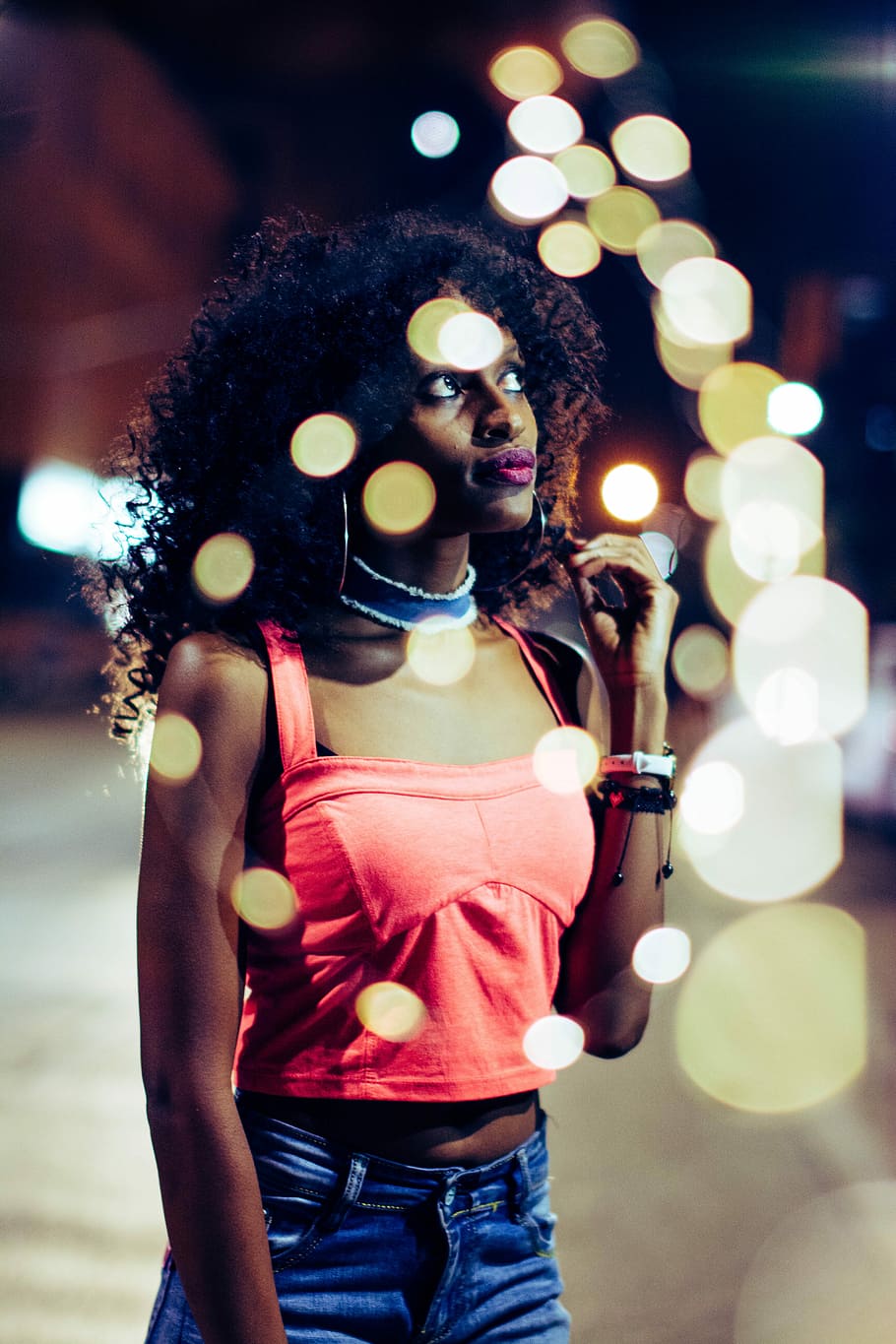 woman wearing red crop top standing near building, women's staring sideways HD wallpaper