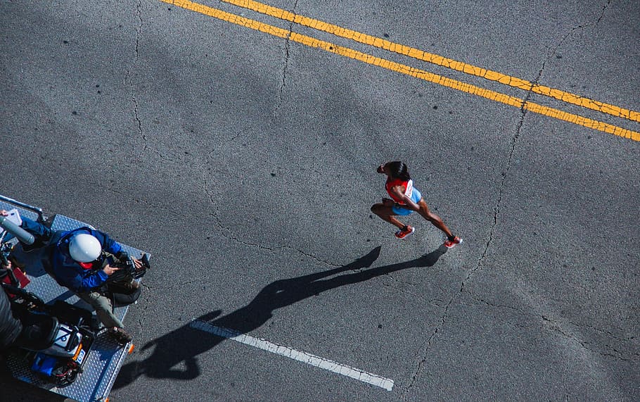 woman running on gray asphalt, photo, red, tops, road, people, HD wallpaper
