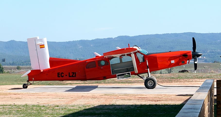 plane, red, propellers, wings, travel, aeronautics, wheels HD wallpaper