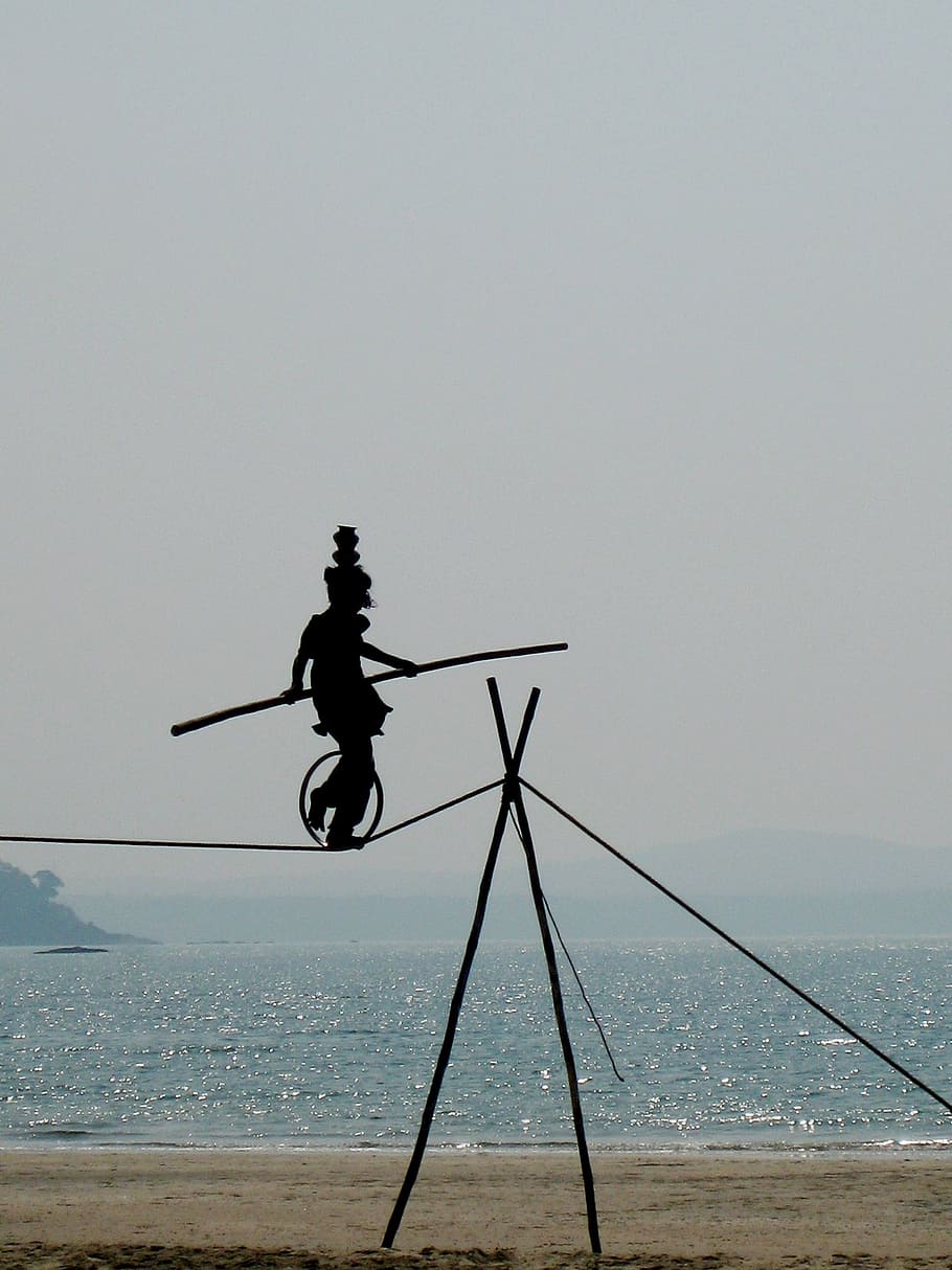 silhouette photography of rope balancer, acrobat, risk, sea HD wallpaper