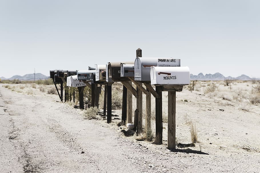 mail boxes, assorted-color metal mailbox lot in a desert, street HD wallpaper