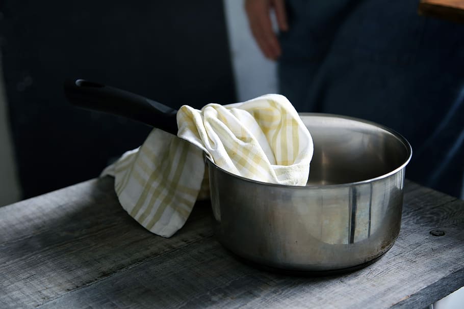 yellow and white textile on top of gray saucepan, yellow and white plaid handkerchief inside pot HD wallpaper