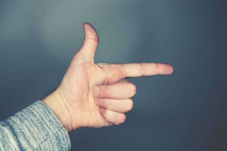 person's left hand doing gun sign, person showing arrow right hand sign, HD wallpaper