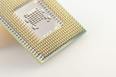 gold-colored computer processor unit on white surface, cpu HD wallpaper