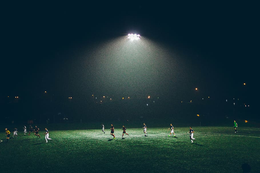 people on grass field at nighttime, soccer, group, playing, athletes