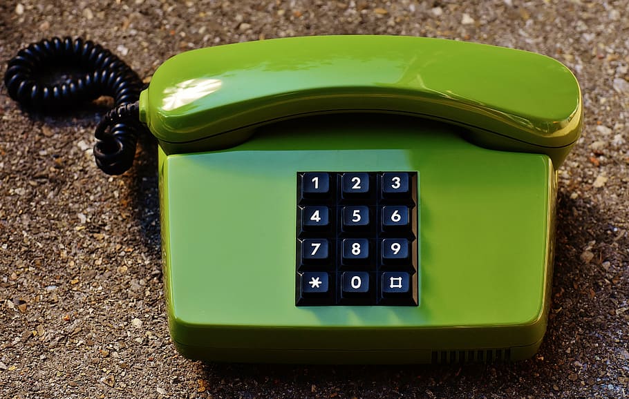 green telephone on gravel, eighties, old, keys, communication