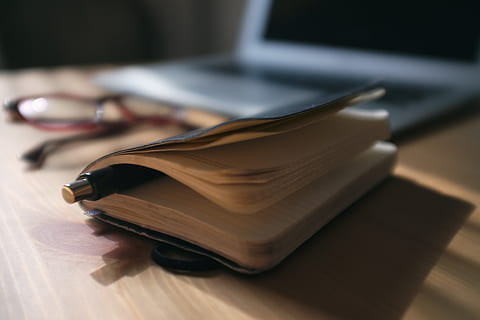 black click pen in between book pages, apple, communication HD wallpaper